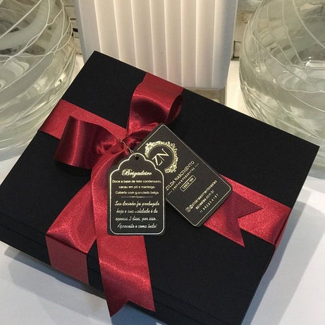 Luxury Black Gift Wrapping with Elegant Red Satin Ribbon – Perfect for All Occasions