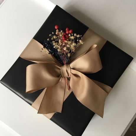 Luxury Black Gift Packaging with Elegant Bow & Dried Floral Decor